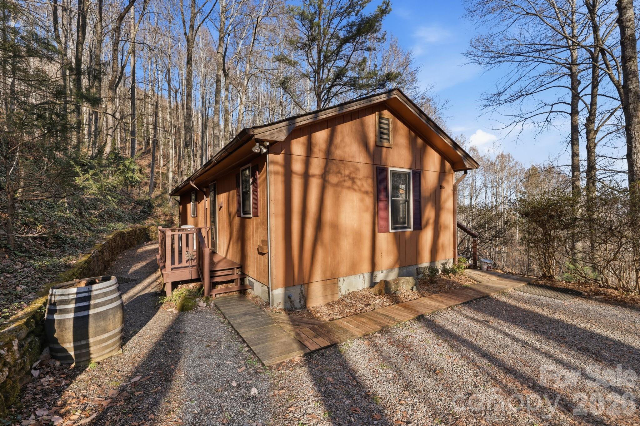 186 Greentree Lane Canton, NC 28716 - Photo 28 of 32 a view of a house with a yard