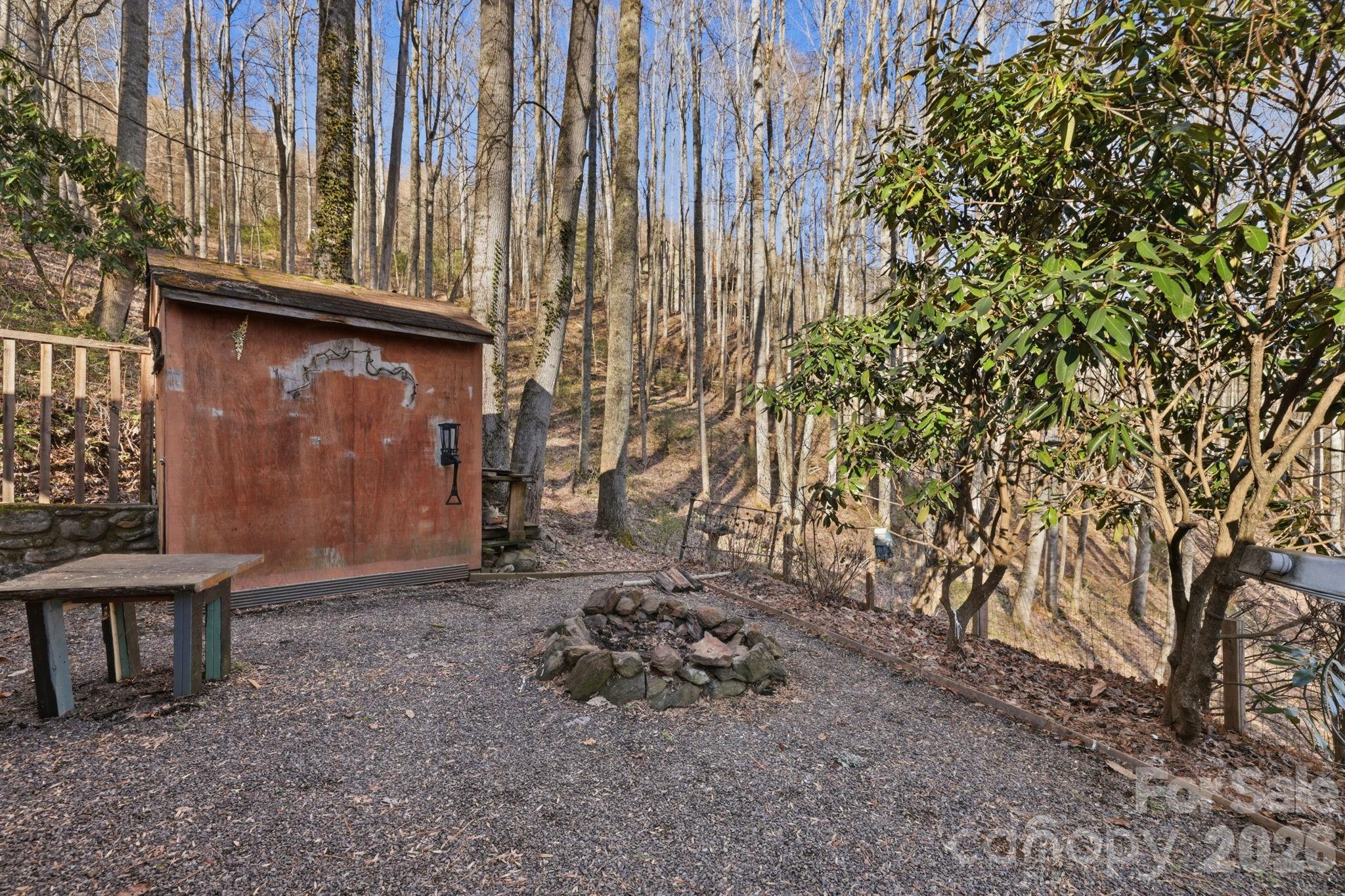 186 Greentree Lane Canton, NC 28716 - Photo 29 of 32 a view of a yard with an outdoor space