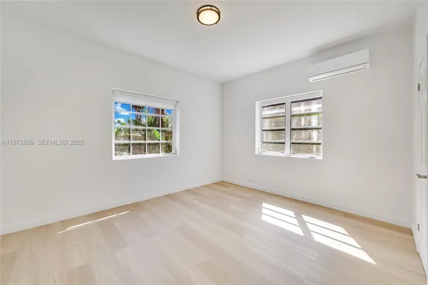 an empty room with windows