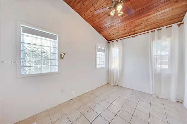 a view of an empty room with window