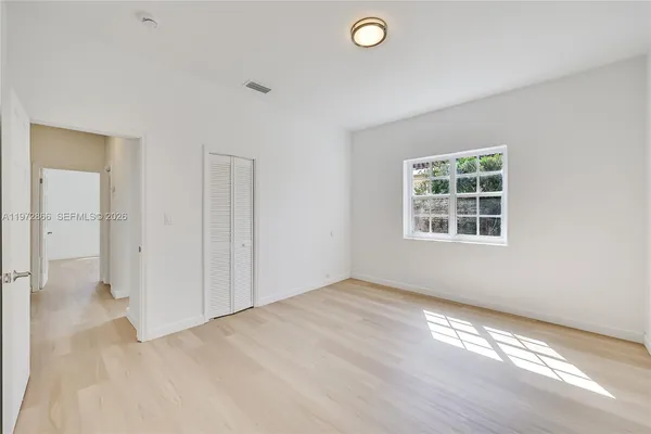 an empty room with windows