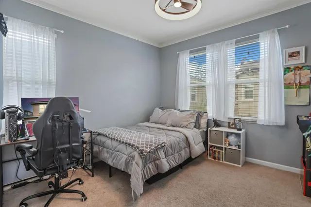 a bedroom with a bed and furniture