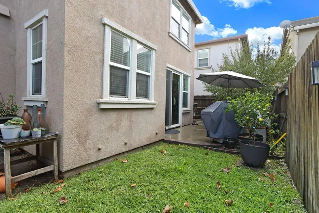 a front view of a house with garage