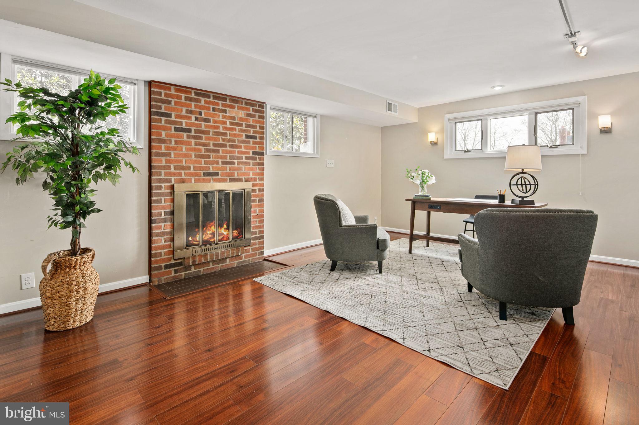 5918 Augusta Drive Springfield, VA 22150 - Photo 35 of 45 Recreation Room w/ Fireplace & Built - Ins