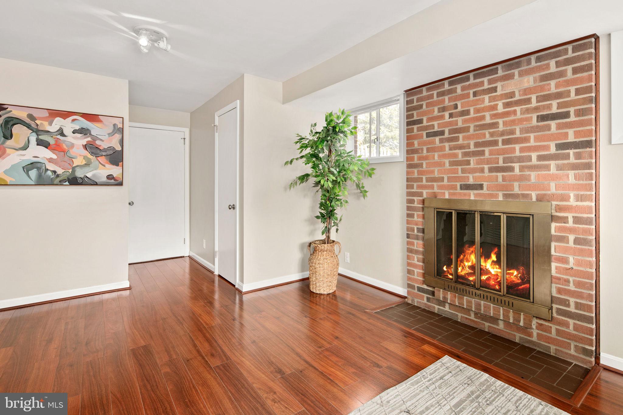 5918 Augusta Drive Springfield, VA 22150 - Photo 39 of 45 Recreation Room w/ Fireplace & Built - Ins