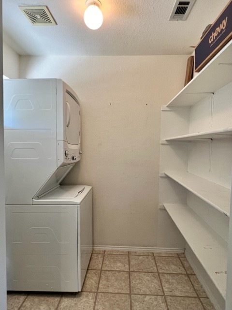 112 Alexis Way Kyle, TX 78640 - Photo 13 of 14 a utility room with cabinets washer and dryer