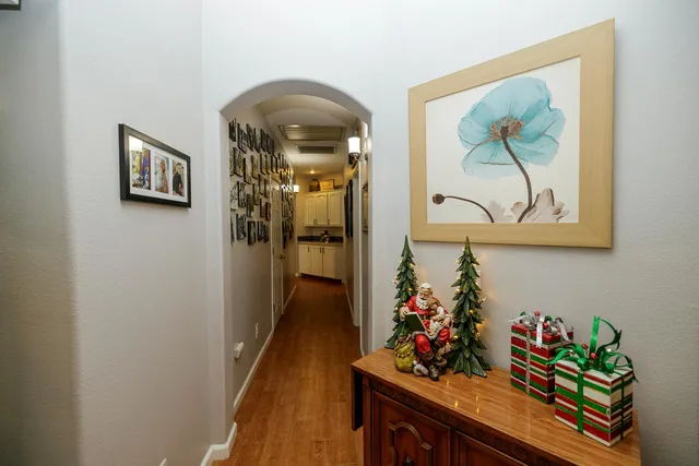 a spacious bedroom with a bed and a couch