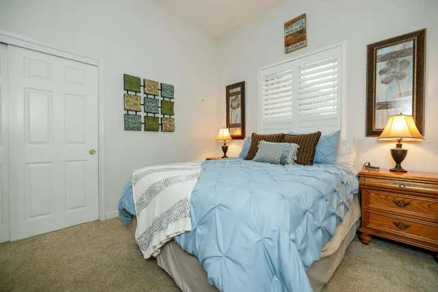 a bathroom with a sink toilet and a mirror