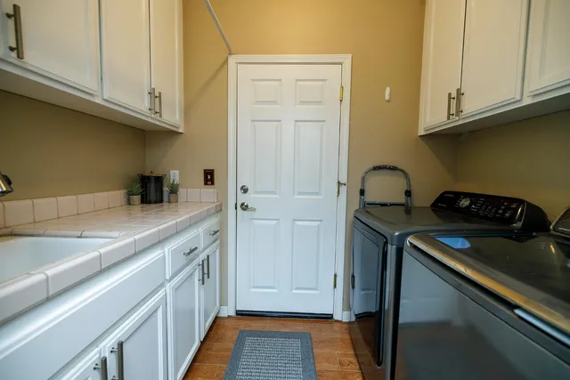 a bedroom with a workspace