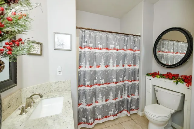 a view of a patio with chair and tables