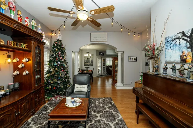 a living room with patio furniture