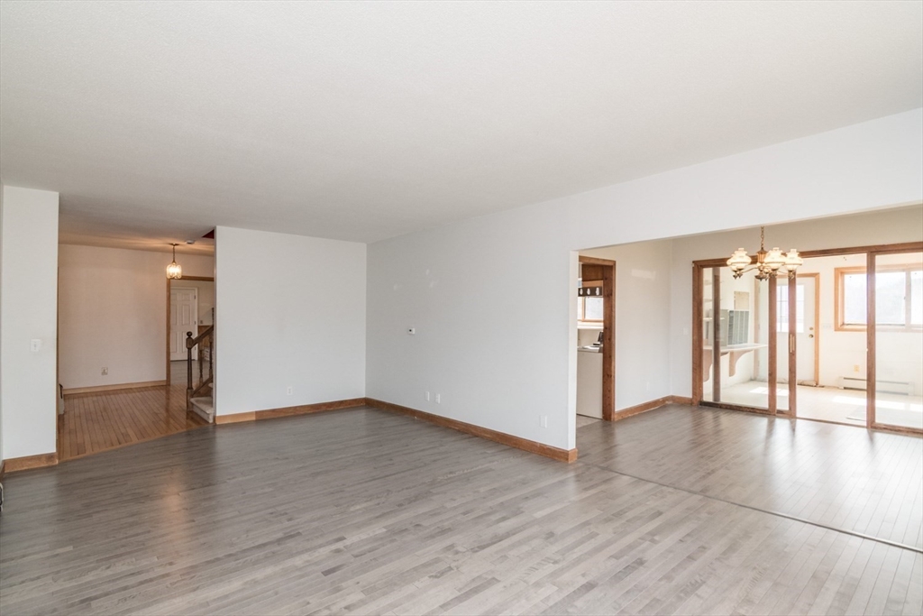 89 Potwine Lane Amherst, MA 01002 - Photo 12 of 37 wooden floor in an empty room with a window