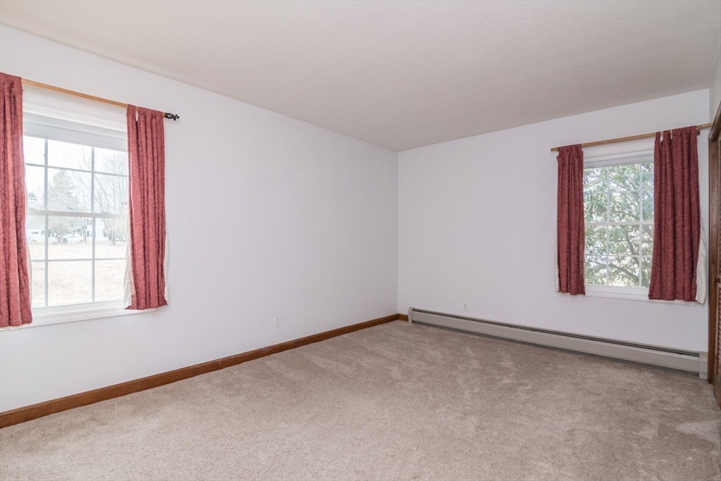 89 Potwine Lane Amherst, MA 01002 - Photo 14 of 37 an empty room with windows