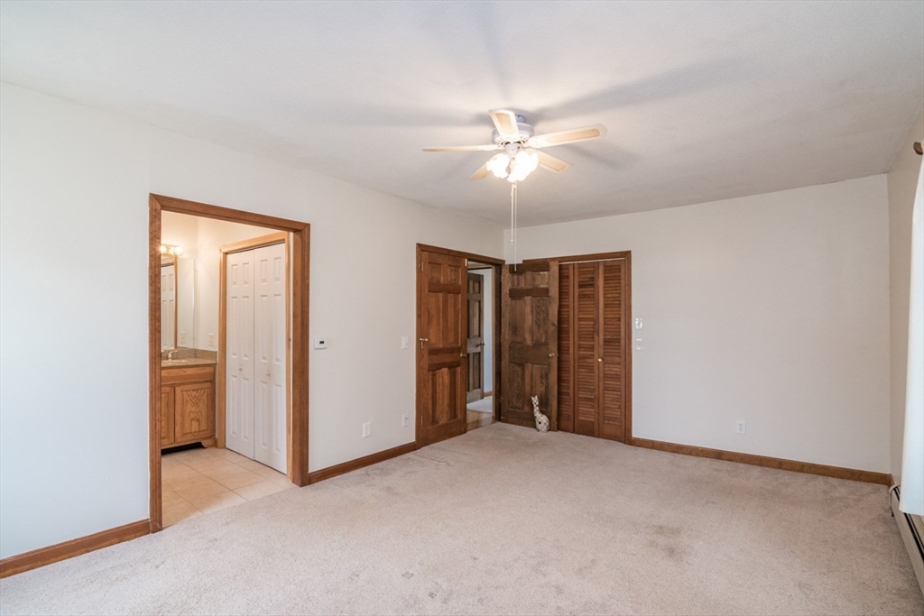 89 Potwine Lane Amherst, MA 01002 - Photo 15 of 37 a view of an empty room with a window