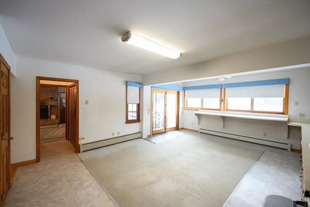 an empty room with windows