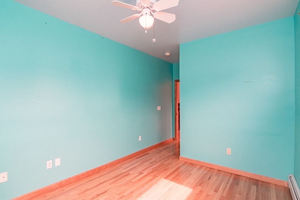 89 Potwine Lane Amherst, MA 01002 - Photo 22 of 37 a view of an empty room with a window