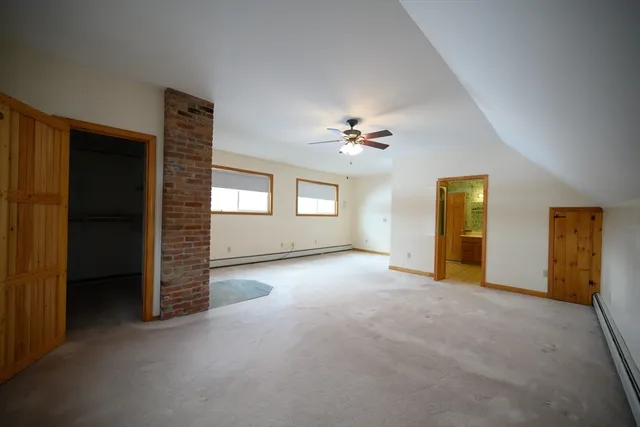 a view of empty room with windows