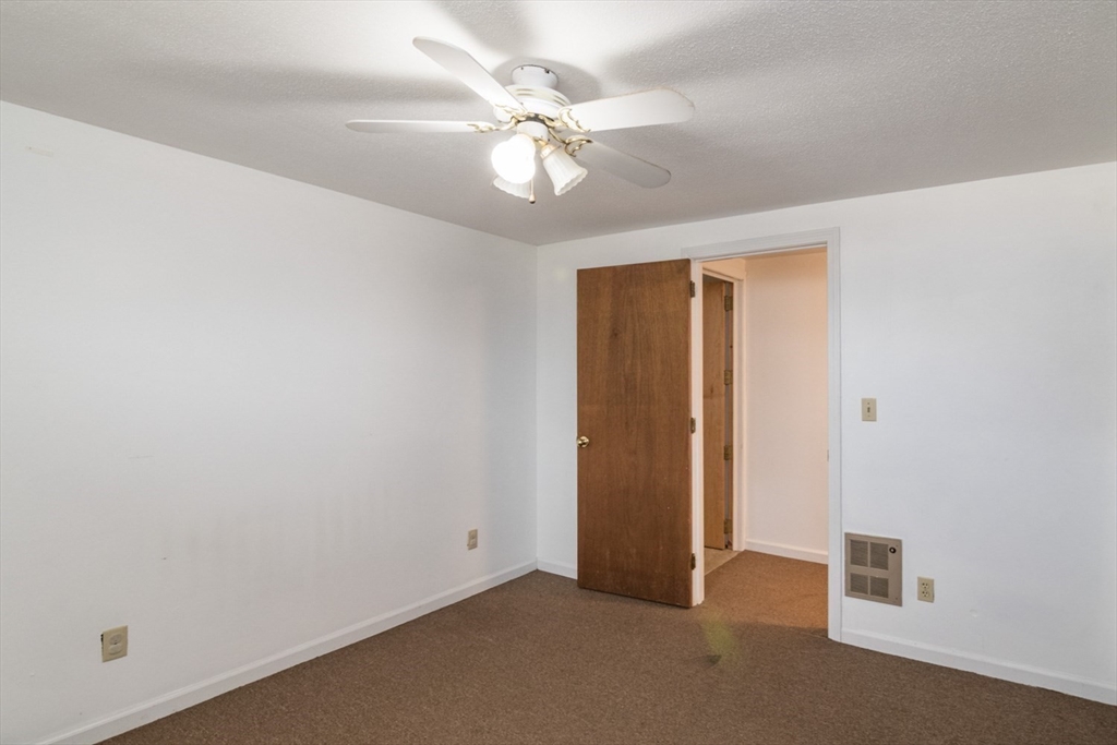89 Potwine Lane Amherst, MA 01002 - Photo 29 of 37 an empty room with fan and fan