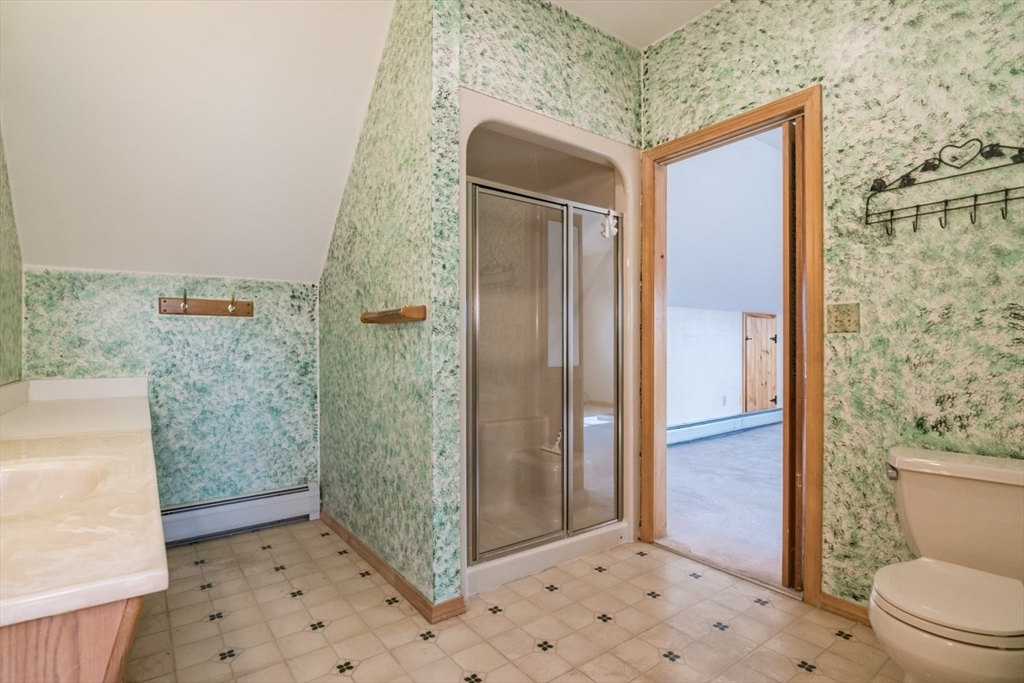89 Potwine Lane Amherst, MA 01002 - Photo 32 of 37 a bathroom with a shower and a toilet