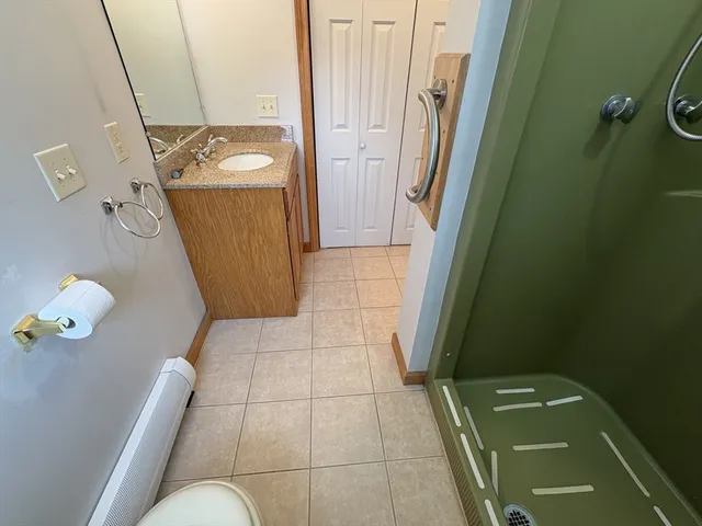 a bathroom with a sink and mirror