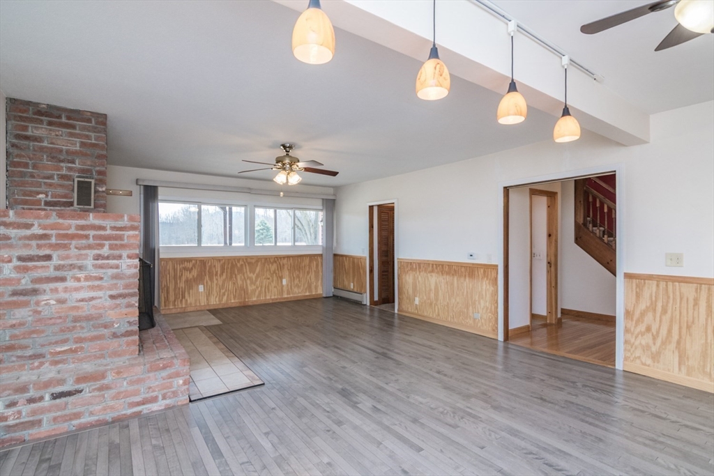 89 Potwine Lane Amherst, MA 01002 - Photo 5 of 37 a view of an empty room and wooden floor