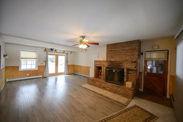 a view of a livingroom with a fireplace