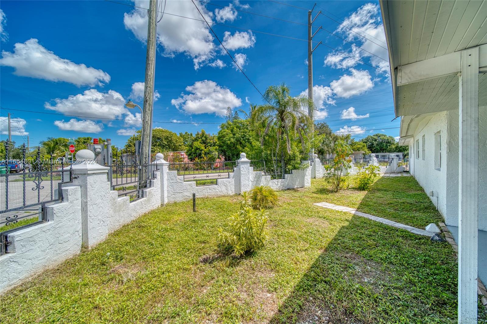 2000 Service Road Opa-Locka, FL 33054 - Photo 8 of 34 a view of a swimming pool with a patio