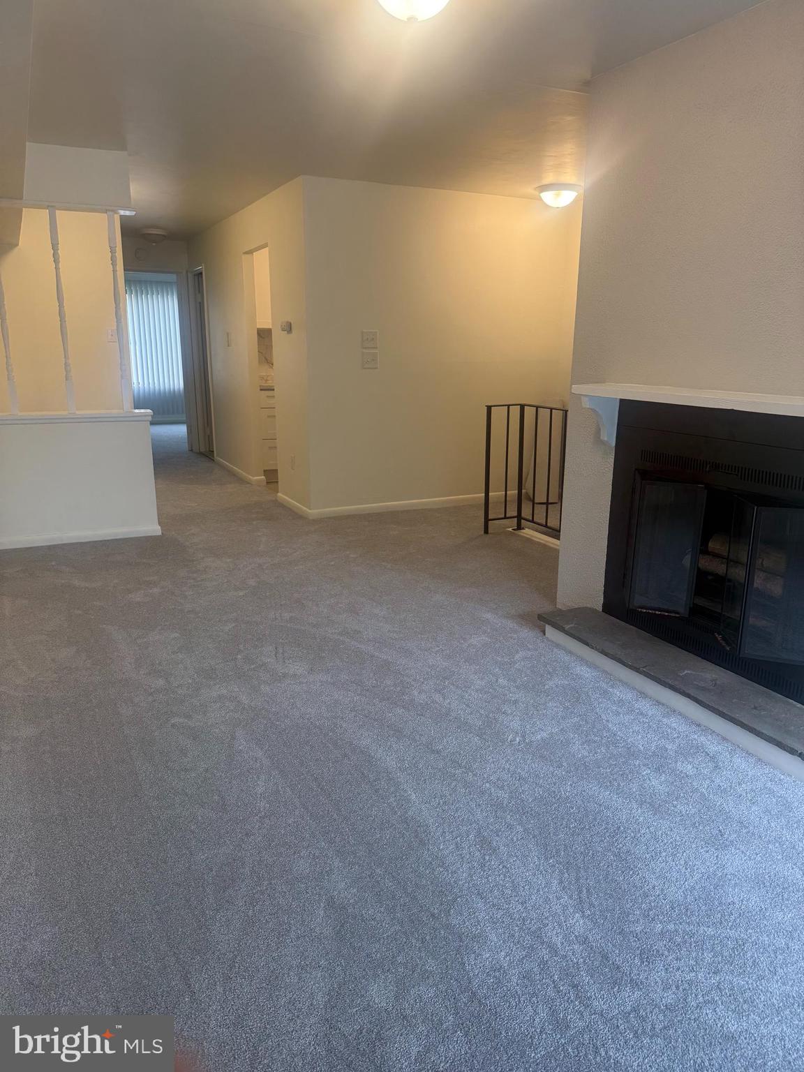 74 Lancaster Estates Mount Joy, PA 17552 - Photo 2 of 6 a view of an empty room with a fireplace