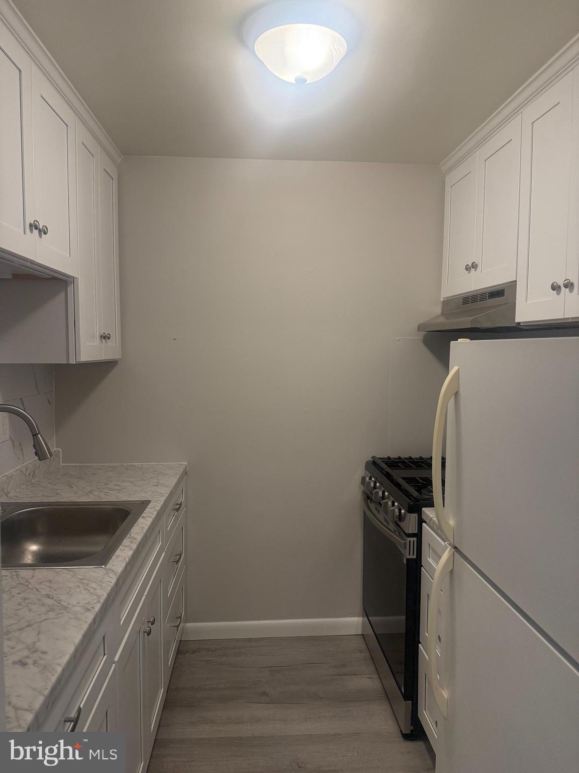 74 Lancaster Estates Mount Joy, PA 17552 - Photo 4 of 6 a kitchen that has a sink and a stove