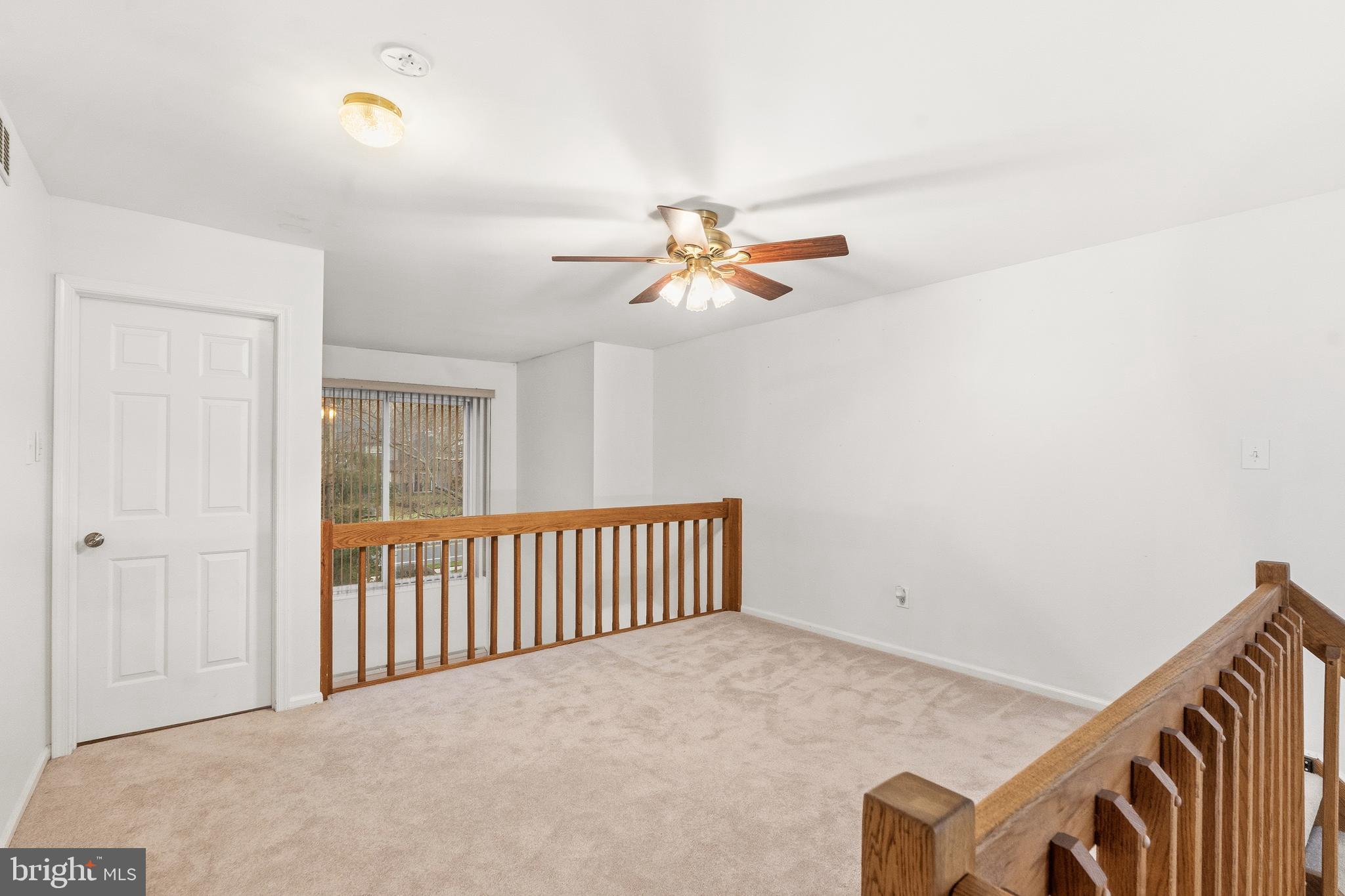 8 Brookline Court, Unit B Princeton, NJ 08540 - Photo 34 of 53 a view of an empty room with a ceiling fan