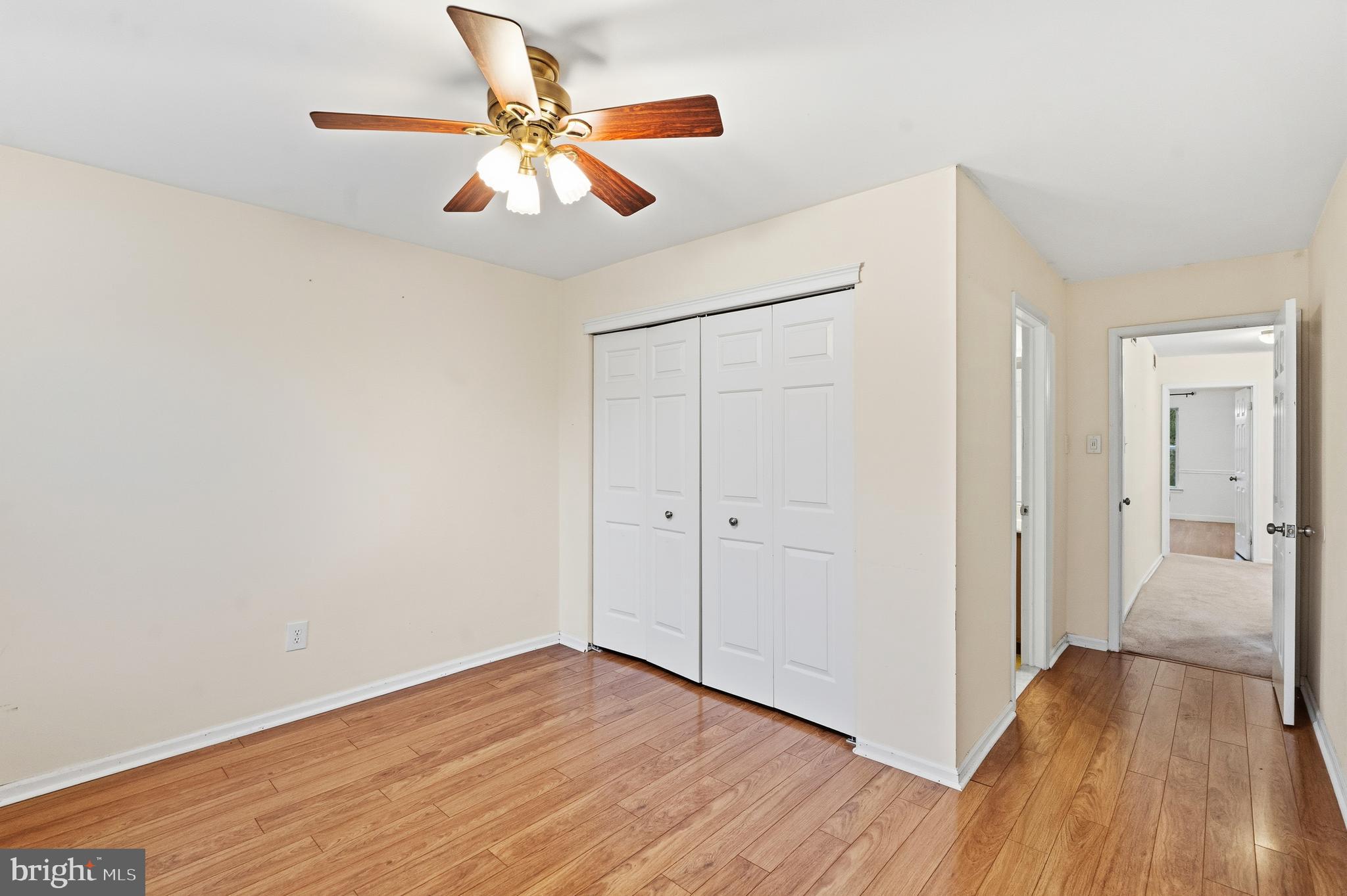 8 Brookline Court, Unit B Princeton, NJ 08540 - Photo 43 of 53 a view of a room with wooden floor and white walls