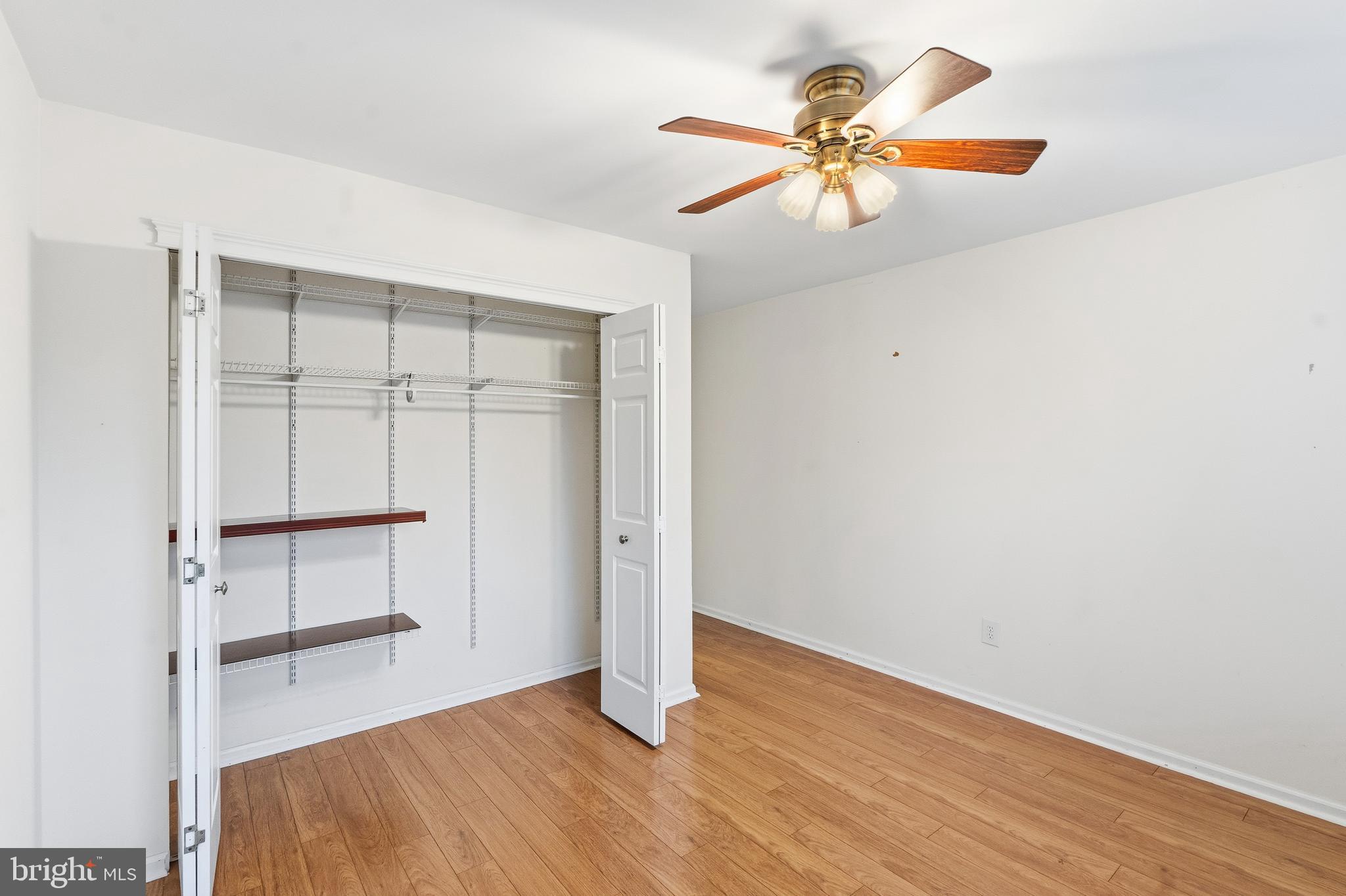 8 Brookline Court, Unit B Princeton, NJ 08540 - Photo 46 of 53 an empty room with closet and windows