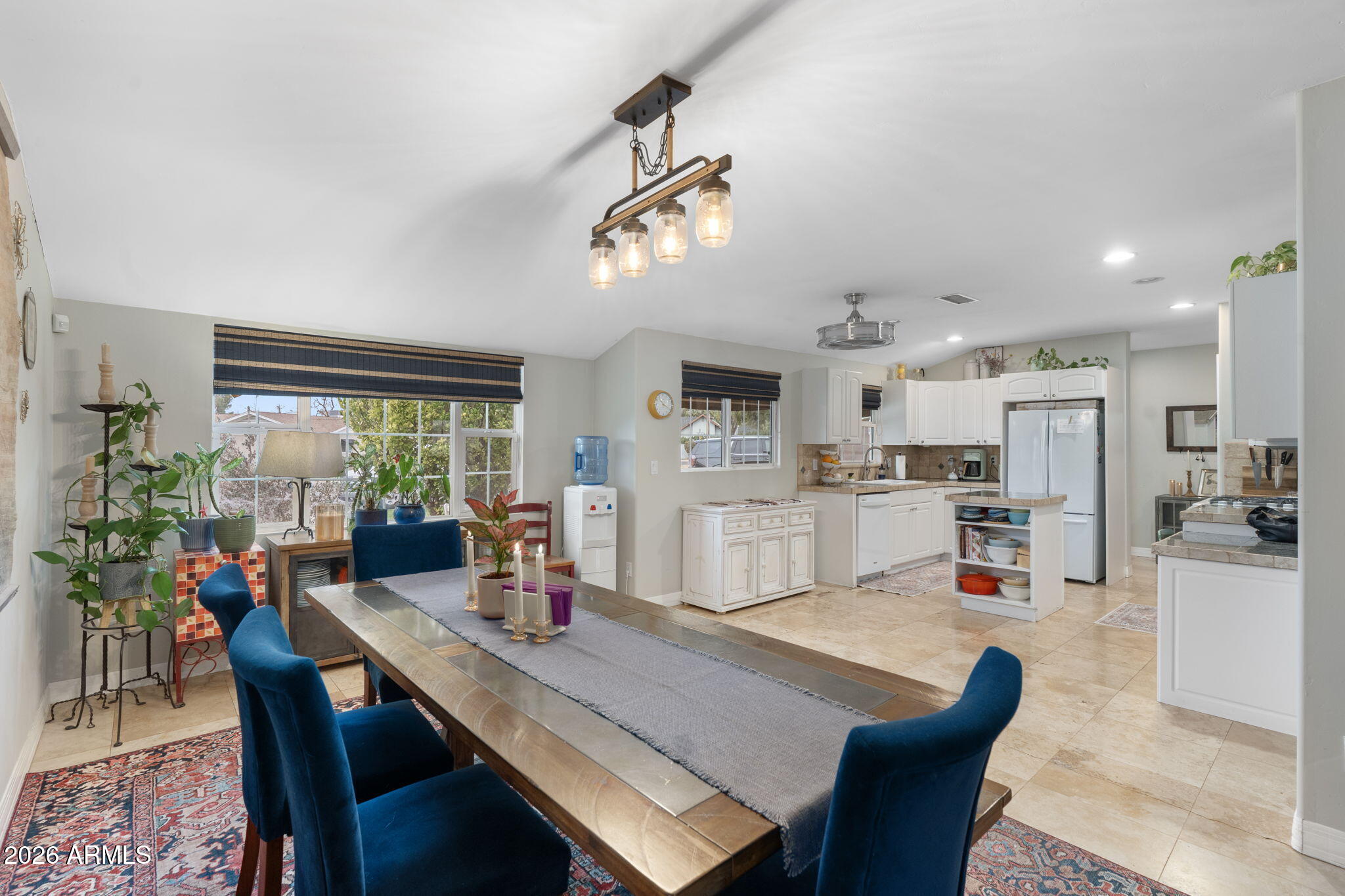 3033 North 53rd Street Phoenix, AZ 85018 - Photo 13 of 40 a view of a dining room with furniture window and outside view