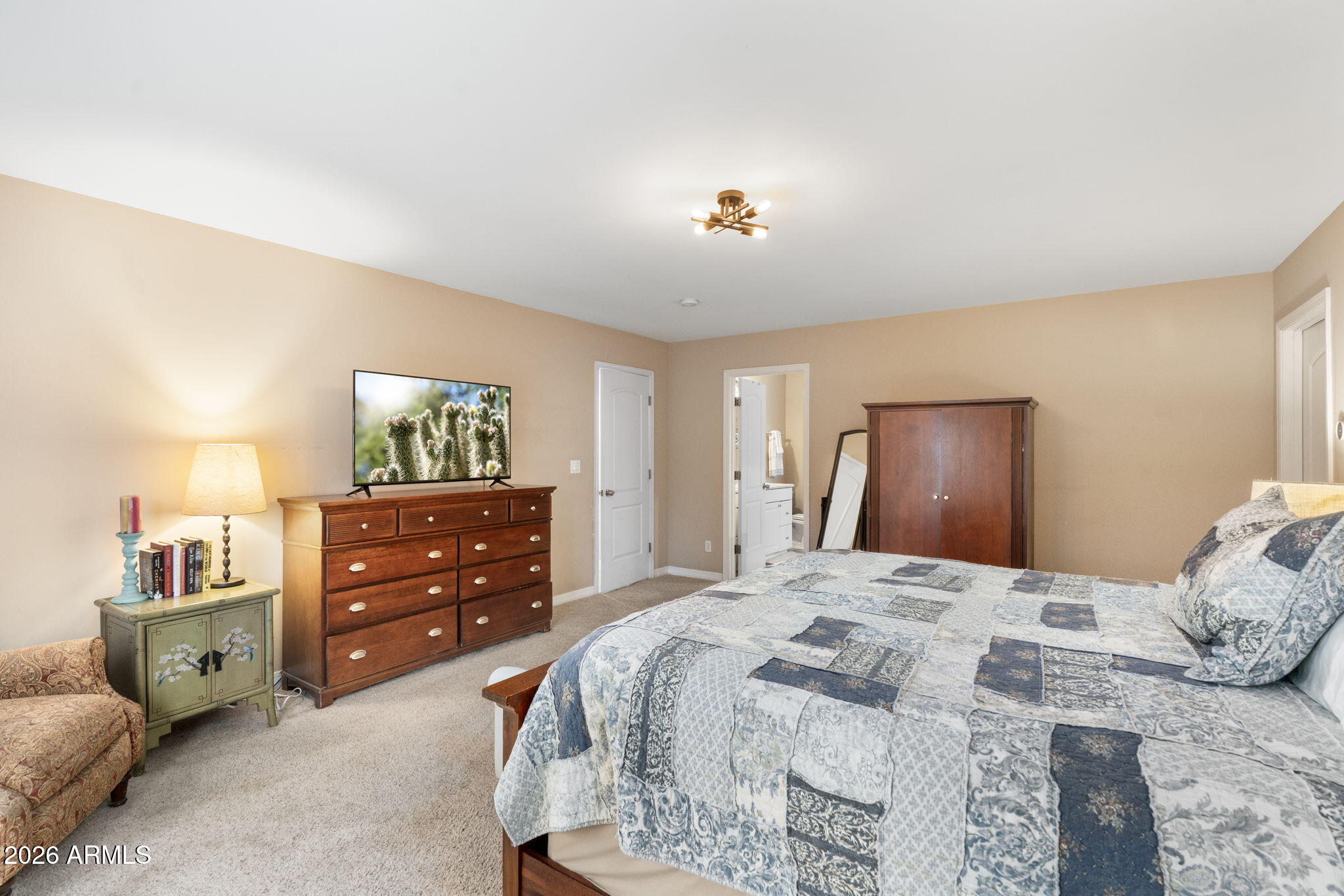 3033 North 53rd Street Phoenix, AZ 85018 - Photo 16 of 40 a bedroom with a bed and a mirror