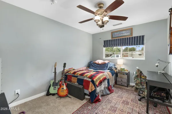 a view of a yard with a house and garden