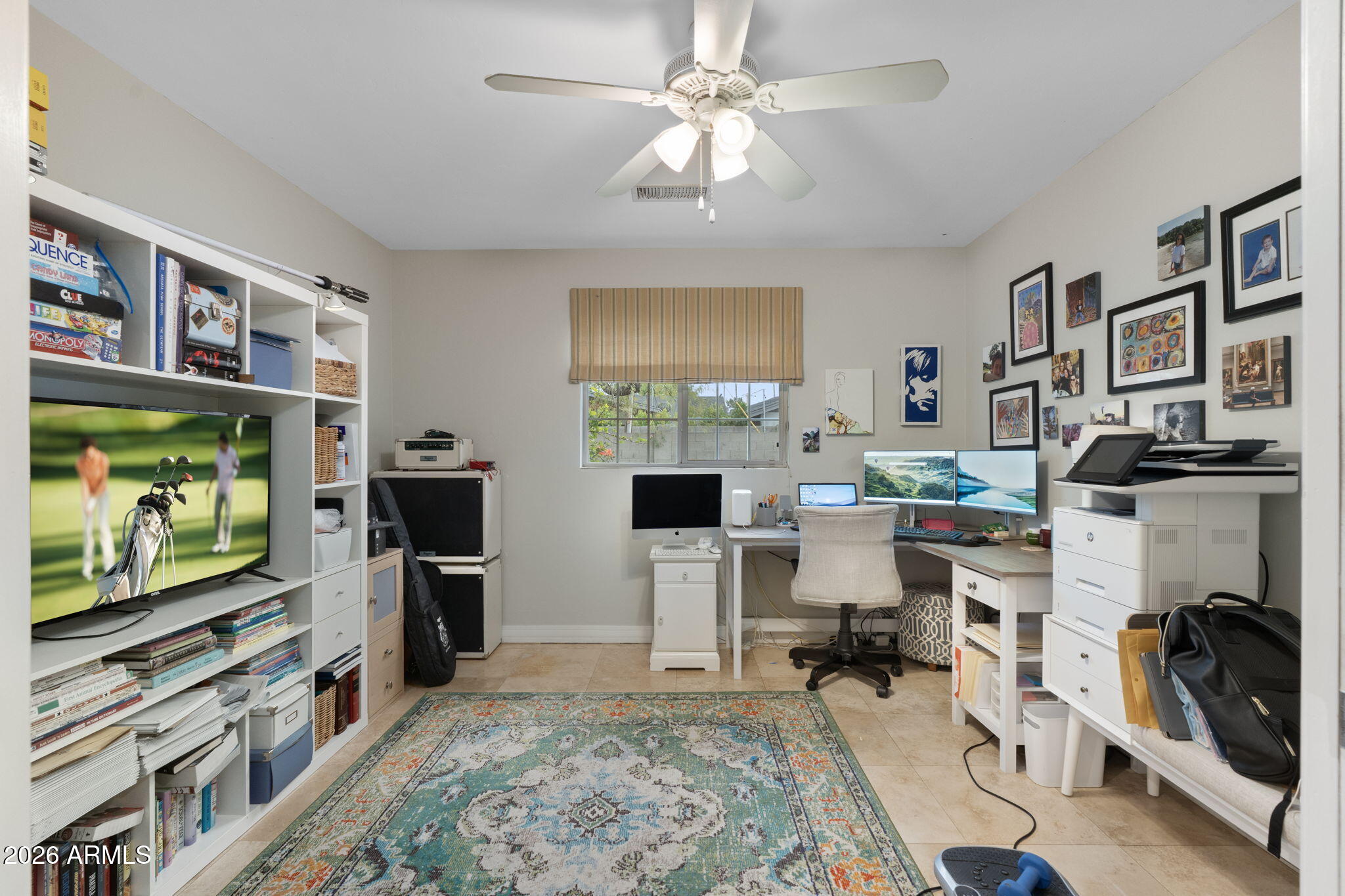 3033 North 53rd Street Phoenix, AZ 85018 - Photo 26 of 40 a view of a livingroom with workspace and a window