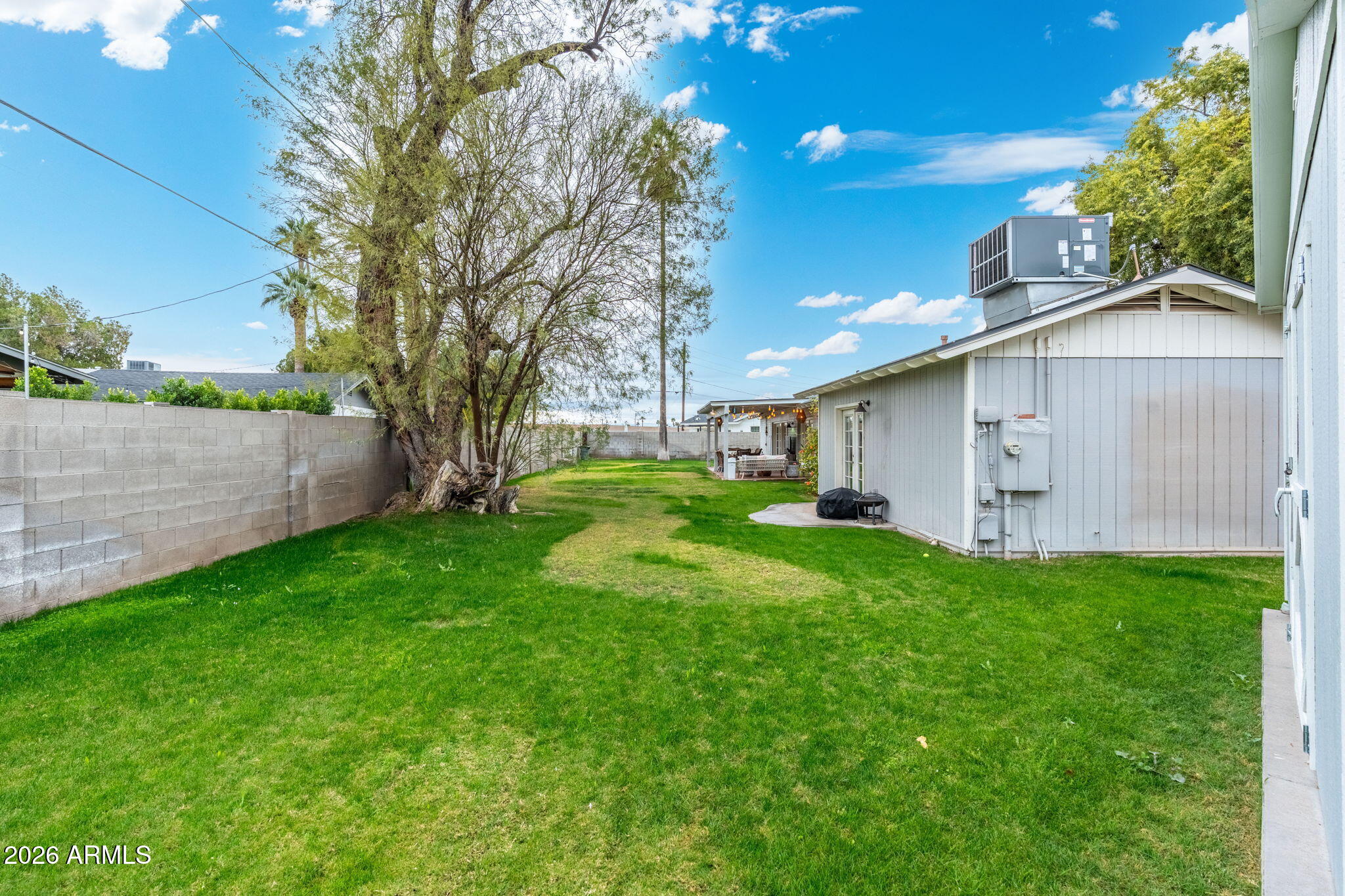 3033 North 53rd Street Phoenix, AZ 85018 - Photo 28 of 40 a view of a yard with a house and garden