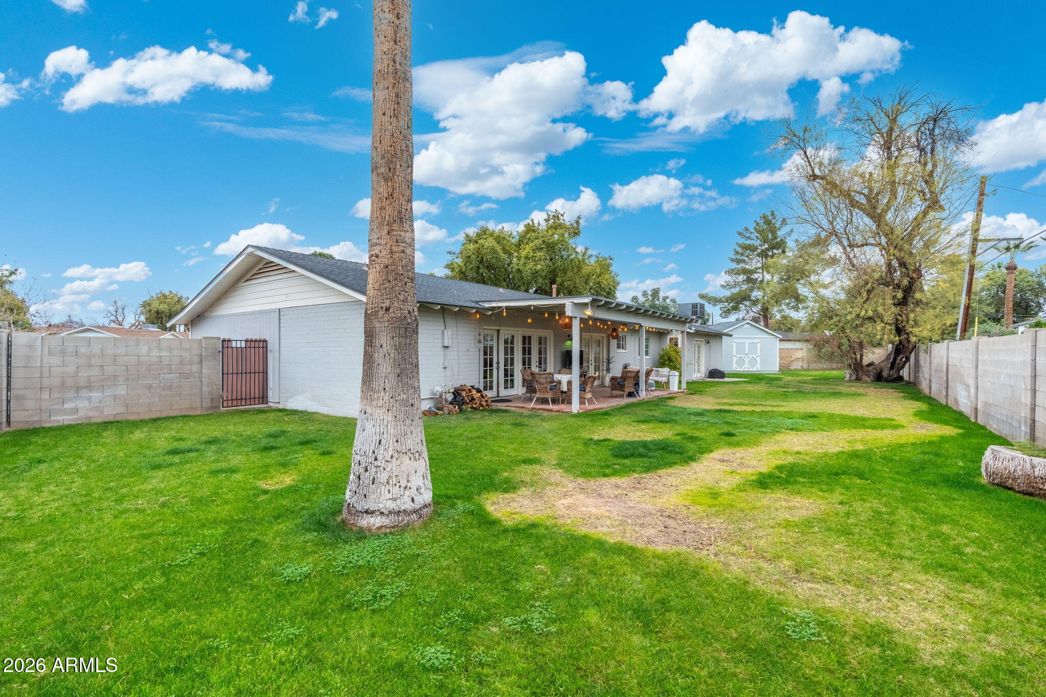 3033 North 53rd Street Phoenix, AZ 85018 - Photo 30 of 40 a view of a house with backyard and garden