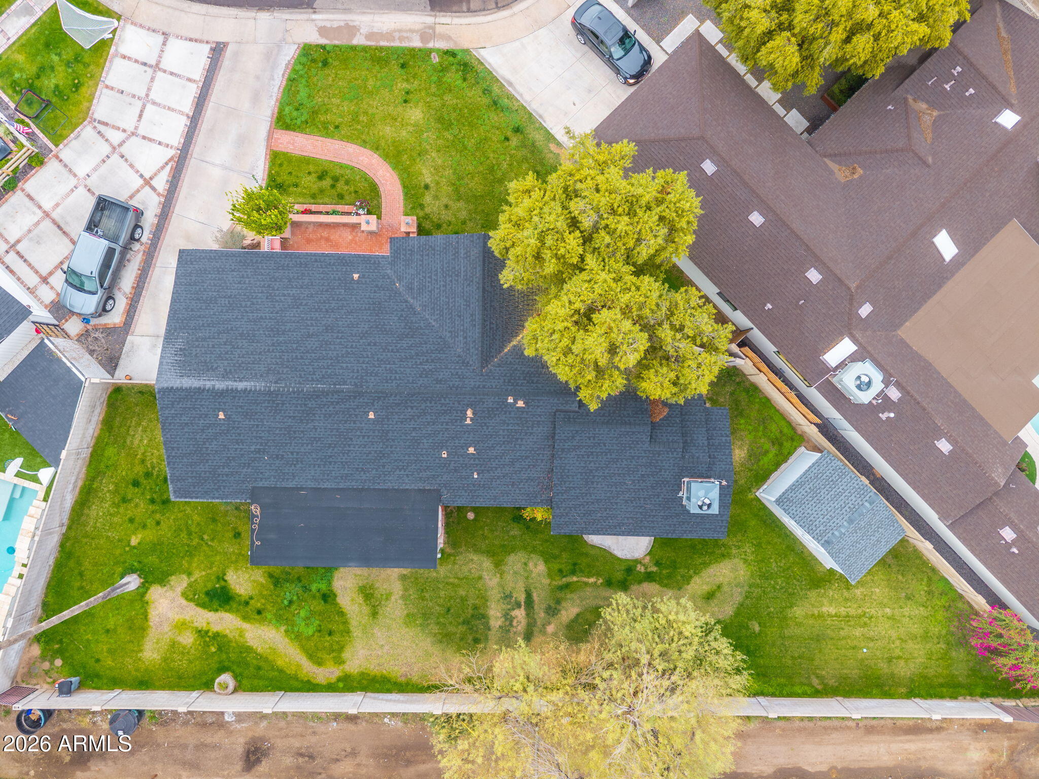 3033 North 53rd Street Phoenix, AZ 85018 - Photo 35 of 40 an aerial view of a house with a yard and a garden