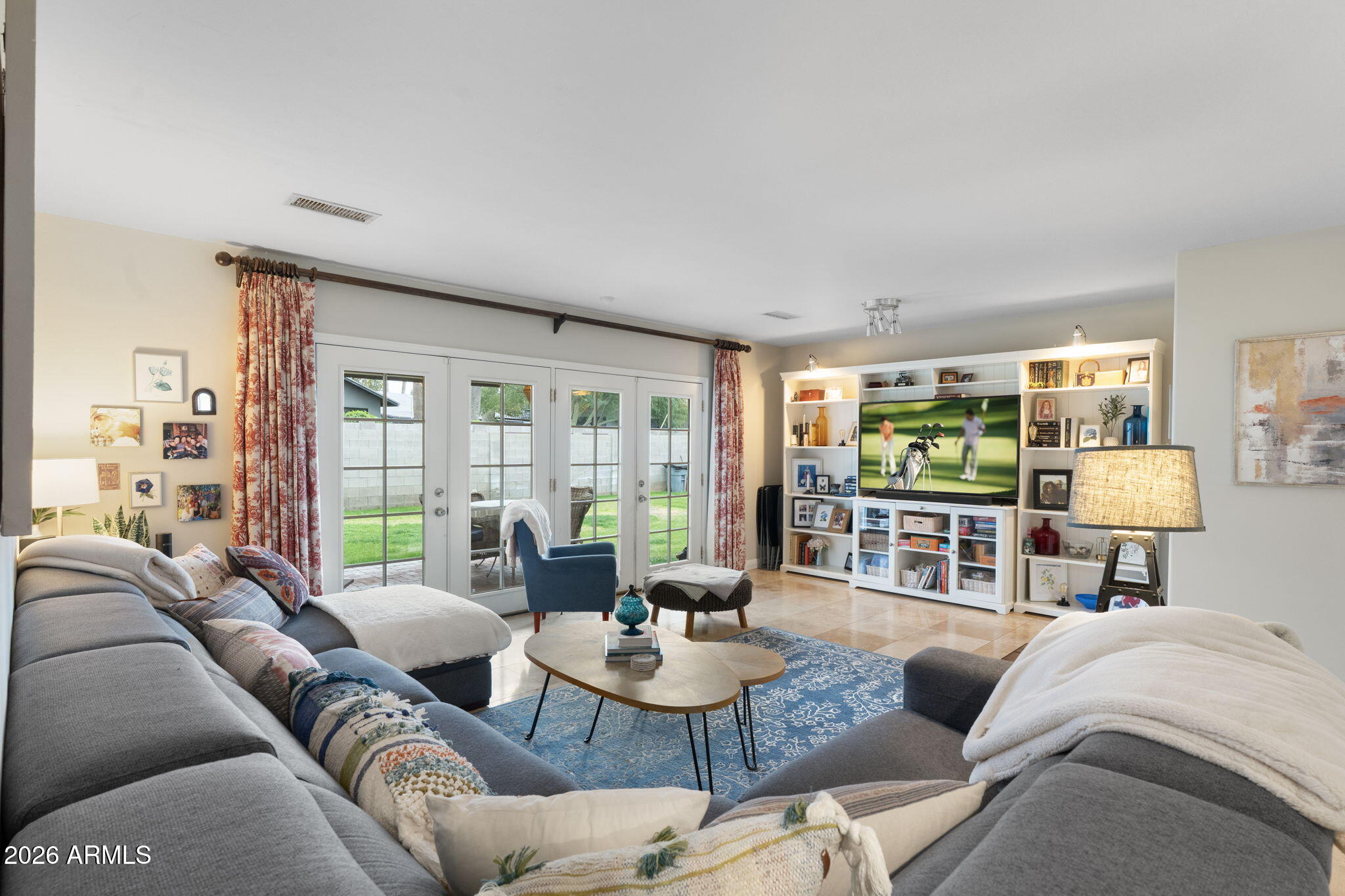 3033 North 53rd Street Phoenix, AZ 85018 - Photo 4 of 40 a living room with furniture and a large window