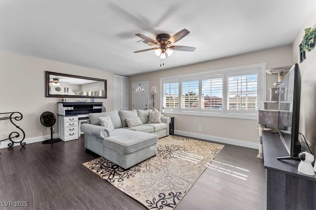 556 7th Street Boulder City, NV 89005 - Photo 3 of 37 Living area featuring a ceiling fan and wood finished floors