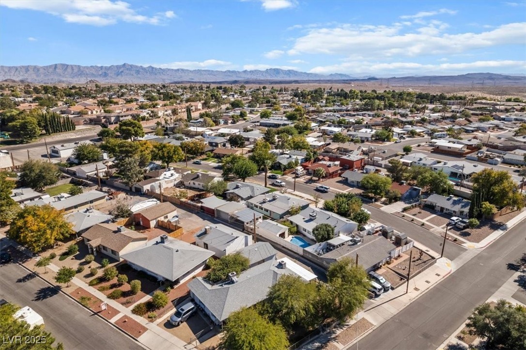 556 7th Street Boulder City, NV 89005 - Photo 37 of 37 Aerial view of residential area featuring a mountain backdrop