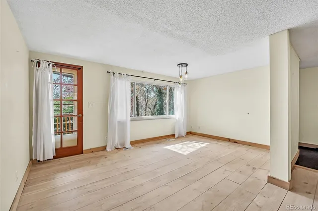 an empty room with windows