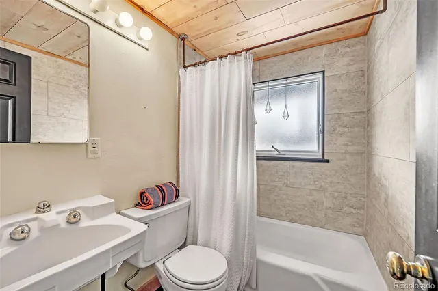 a kitchen with a sink and cabinet