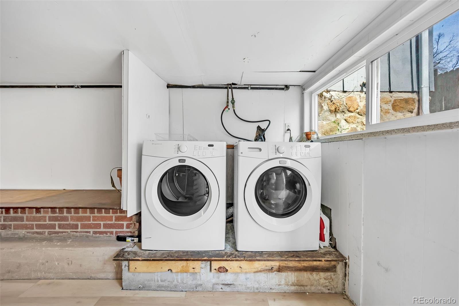 1624 Cheyenne Boulevard Colorado Springs, CO 80906 - Photo 26 of 47 a utility room with dryer and washer