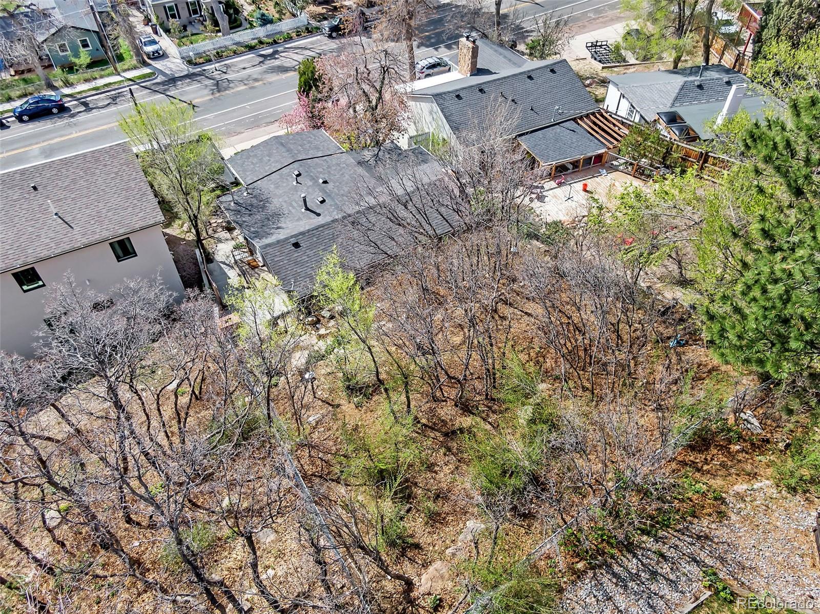 1624 Cheyenne Boulevard Colorado Springs, CO 80906 - Photo 41 of 47 an aerial view of a house with a yard