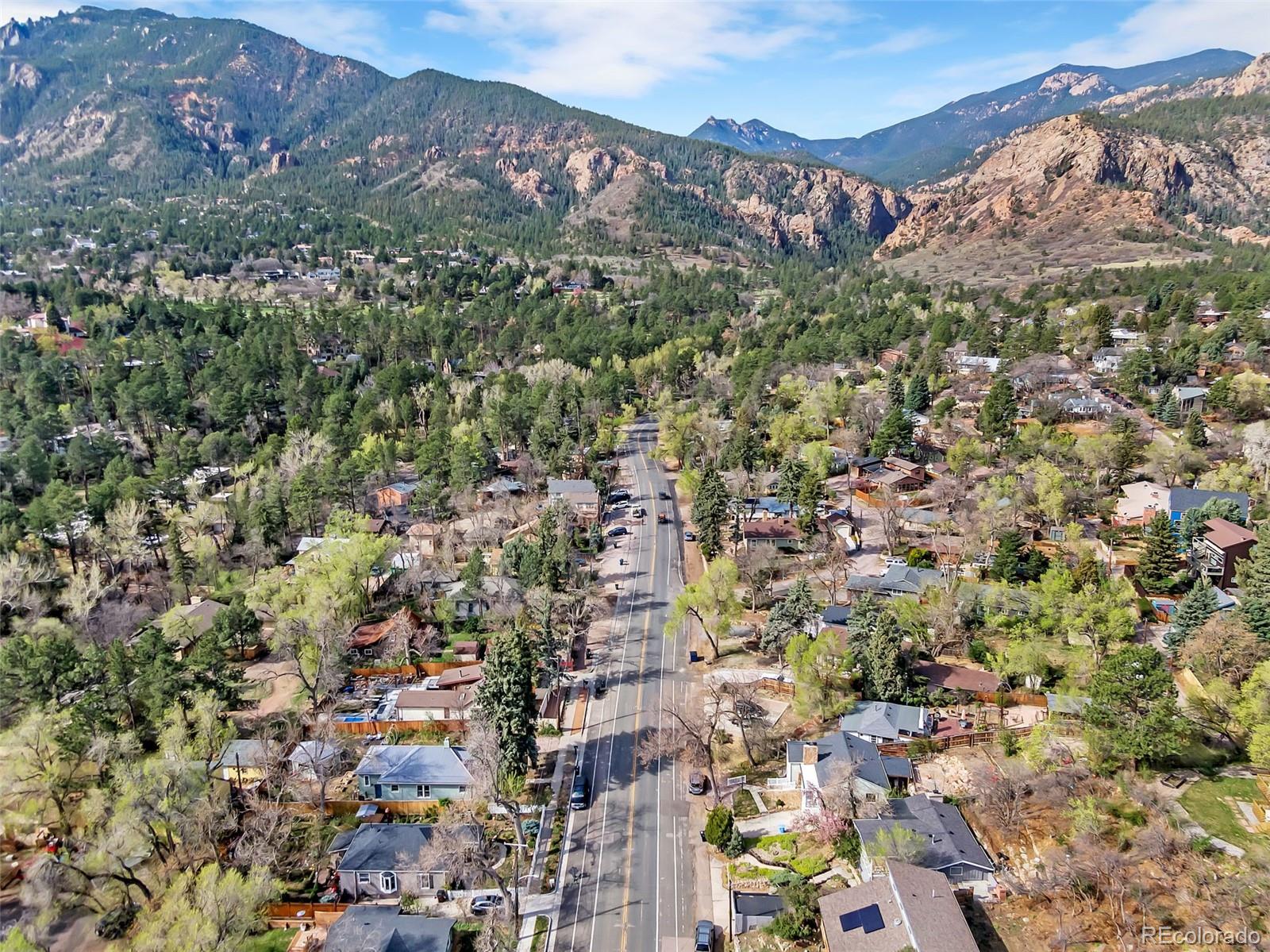 1624 Cheyenne Boulevard Colorado Springs, CO 80906 - Photo 43 of 47 an aerial view of residential house with an outdoor space and seating