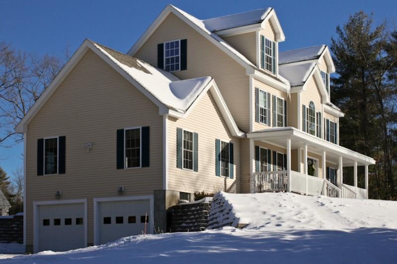 76 Ridlon Road Berwick, ME 03901 - Photo 4 of 35 Front and Garage Winter Scene
