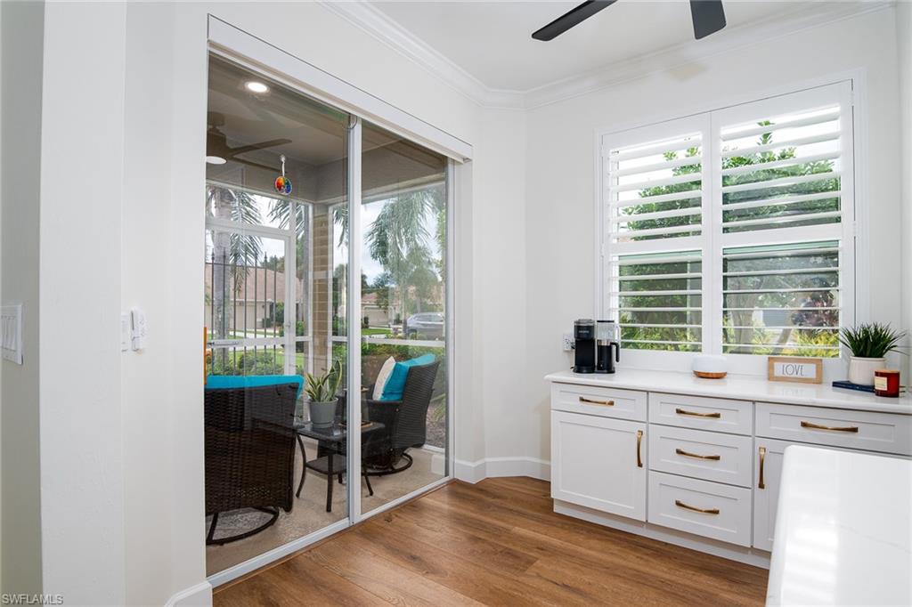 21441 Knighton Run Estero, FL 33928 - Photo 11 of 50 a room with a desk and a window