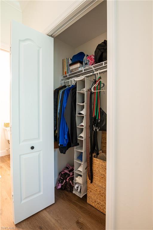 21441 Knighton Run Estero, FL 33928 - Photo 19 of 50 a view of walk in closet with clothes and shoes